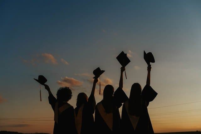 Graduating students celebrating together